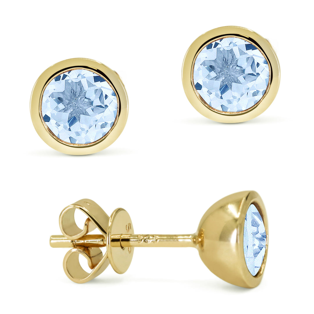 Beautiful Hand Crafted 14K Yellow Gold  Blue Topaz And Diamond Essentials Collection Stud Earrings With A Push Back Closure
