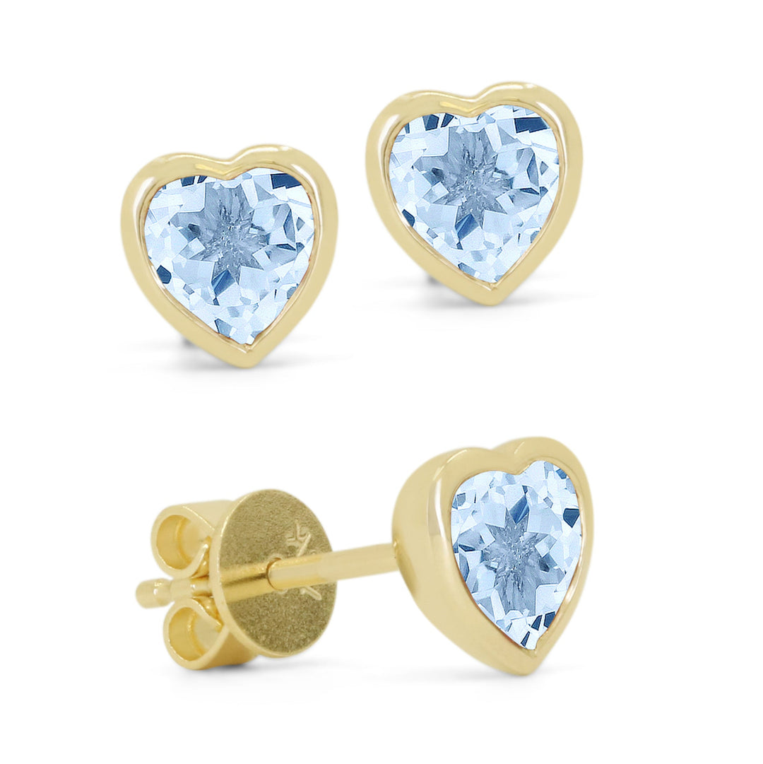 Beautiful Hand Crafted 14K Yellow Gold 5MM Blue Topaz And Diamond Essentials Collection Stud Earrings With A Push Back Closure