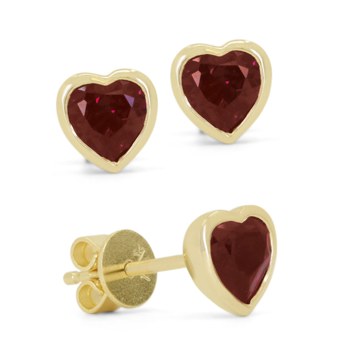 Beautiful Hand Crafted 14K Yellow Gold 5MM Garnet And Diamond Essentials Collection Stud Earrings With A Push Back Closure