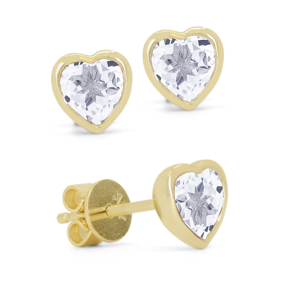 Beautiful Hand Crafted 14K Yellow Gold 5MM White Topaz And Diamond Essentials Collection Stud Earrings With A Push Back Closure