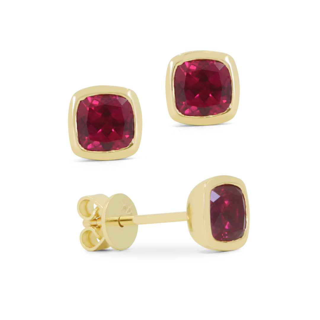 Beautiful Hand Crafted 14K Yellow Gold 5MM Created Ruby And Diamond Essentials Collection Stud Earrings With A Push Back Closure