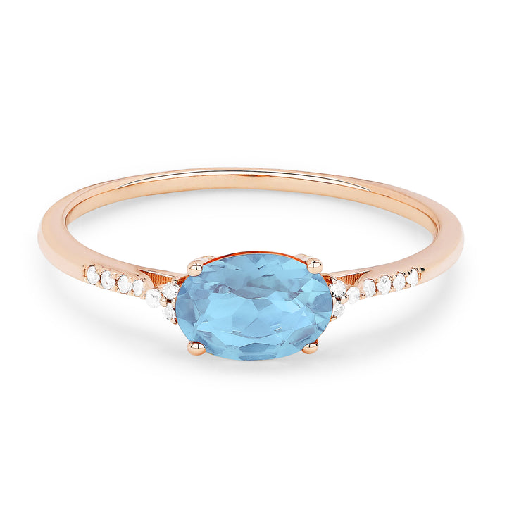 Beautiful Hand Crafted 14K Rose Gold 5x7MM Blue Topaz And Diamond Essentials Collection Ring