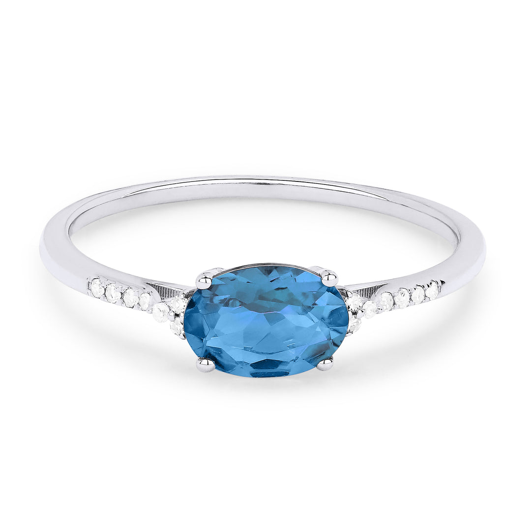 Beautiful Hand Crafted 14K White Gold 5x7MM Swiss Blue Topaz And Diamond Essentials Collection Ring