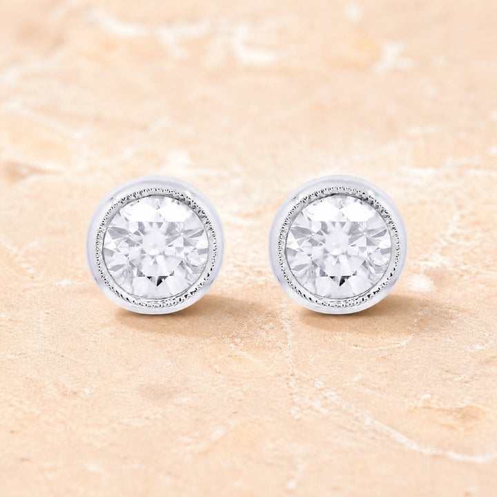 E1470 - 14K White Gold Diamond Round Stud Earrings