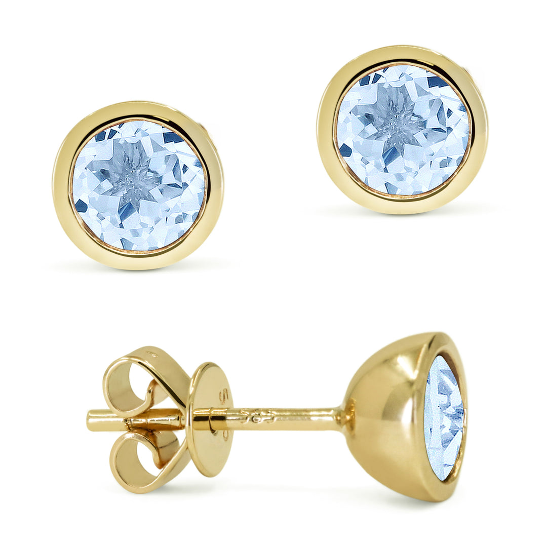 Beautiful Hand Crafted 14K Yellow Gold 5MM Blue Topaz And Diamond Essentials Collection Stud Earrings With A Push Back Closure