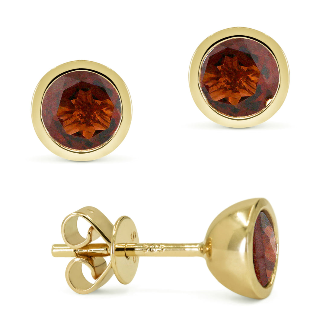 Beautiful Hand Crafted 14K Yellow Gold 5MM Garnet And Diamond Essentials Collection Stud Earrings With A Push Back Closure