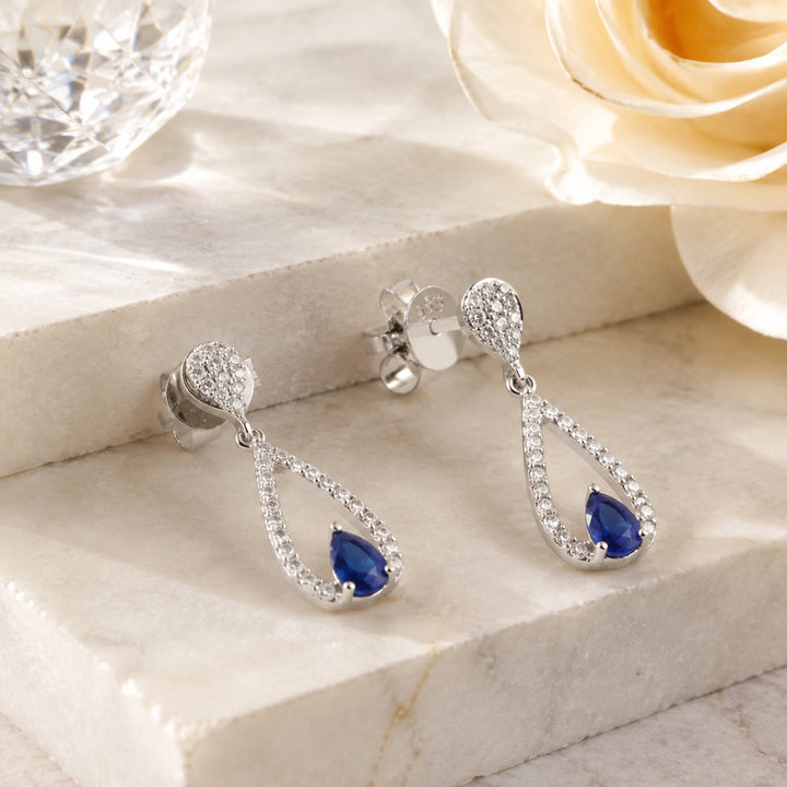 E1886 - 14K White Gold Emerald, Ruby & Sapphire Drop Earrings