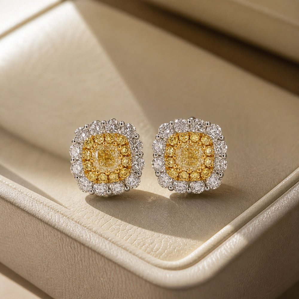 E1909 - 18K White Gold Fancy Yellow Diamond Stud Earrings