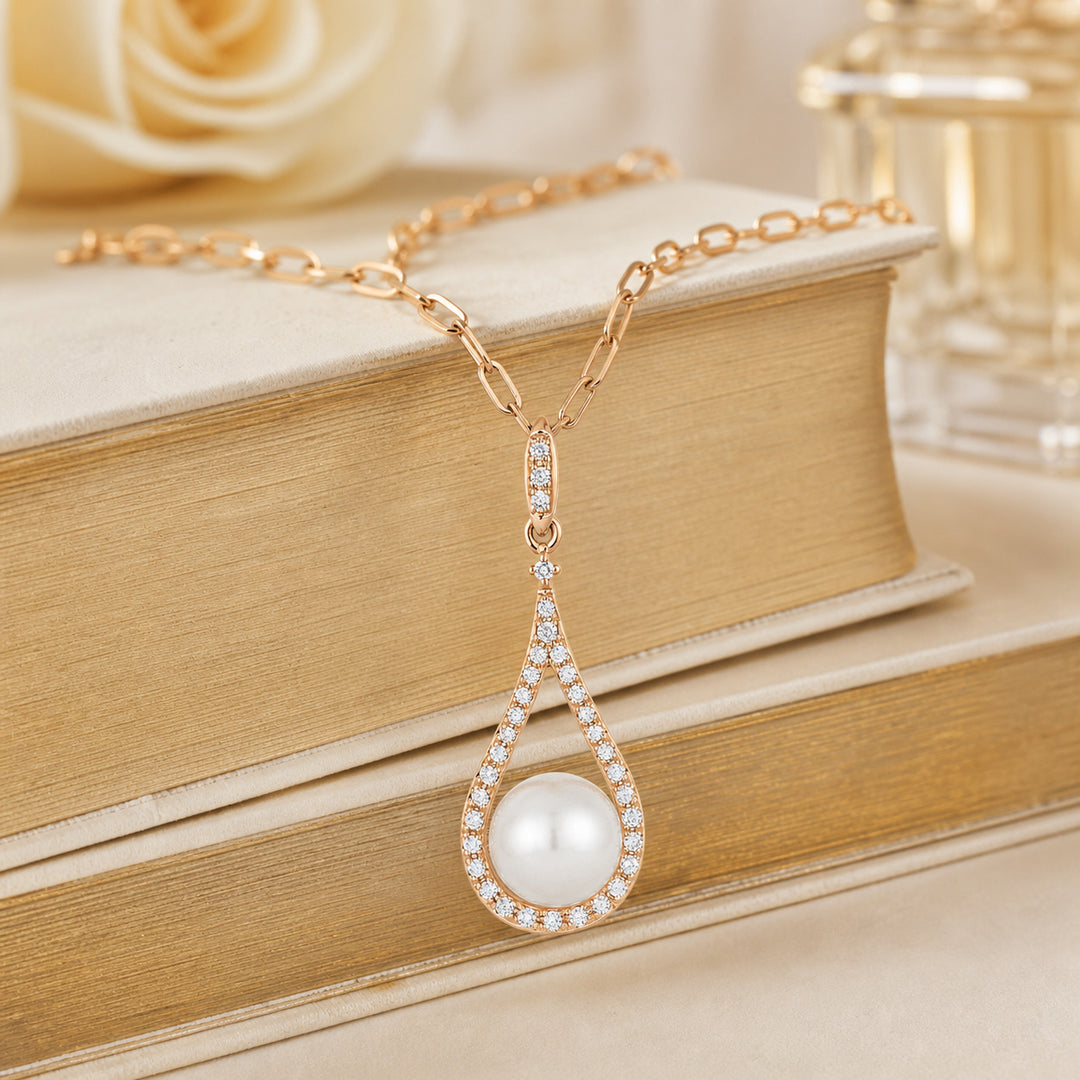 N1558 - 14K Gold Black Onyx & Pearl Pear Pendant