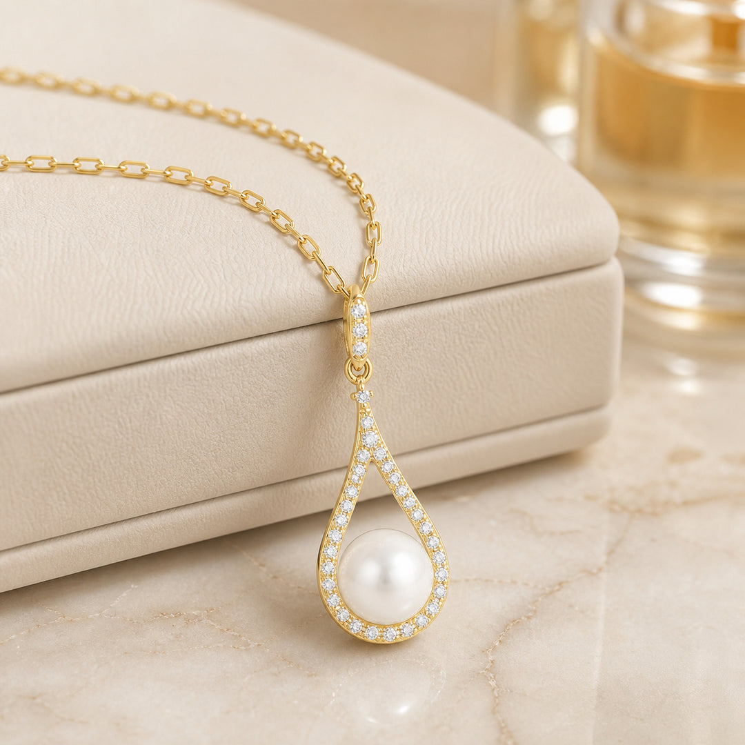 N1558 - 14K Gold Black Onyx & Pearl Pear Pendant