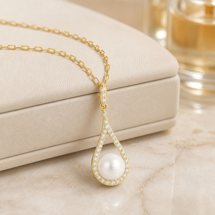 N1558 - 14K Gold Black Onyx & Pearl Pear Pendant