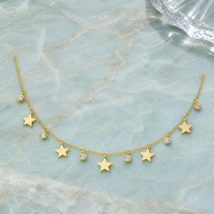 N1667 - 14K Two Tone Gold Diamond Star Necklace