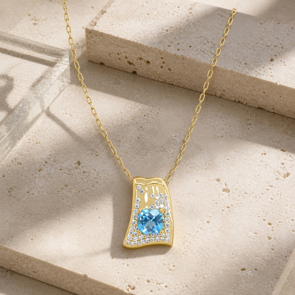 N2100 - 14K Yellow Gold Swiss Blue Topaz Pendant