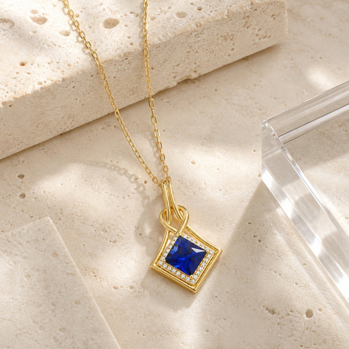 N2137 - 14K Yellow Gold Created Sapphire Pendant
