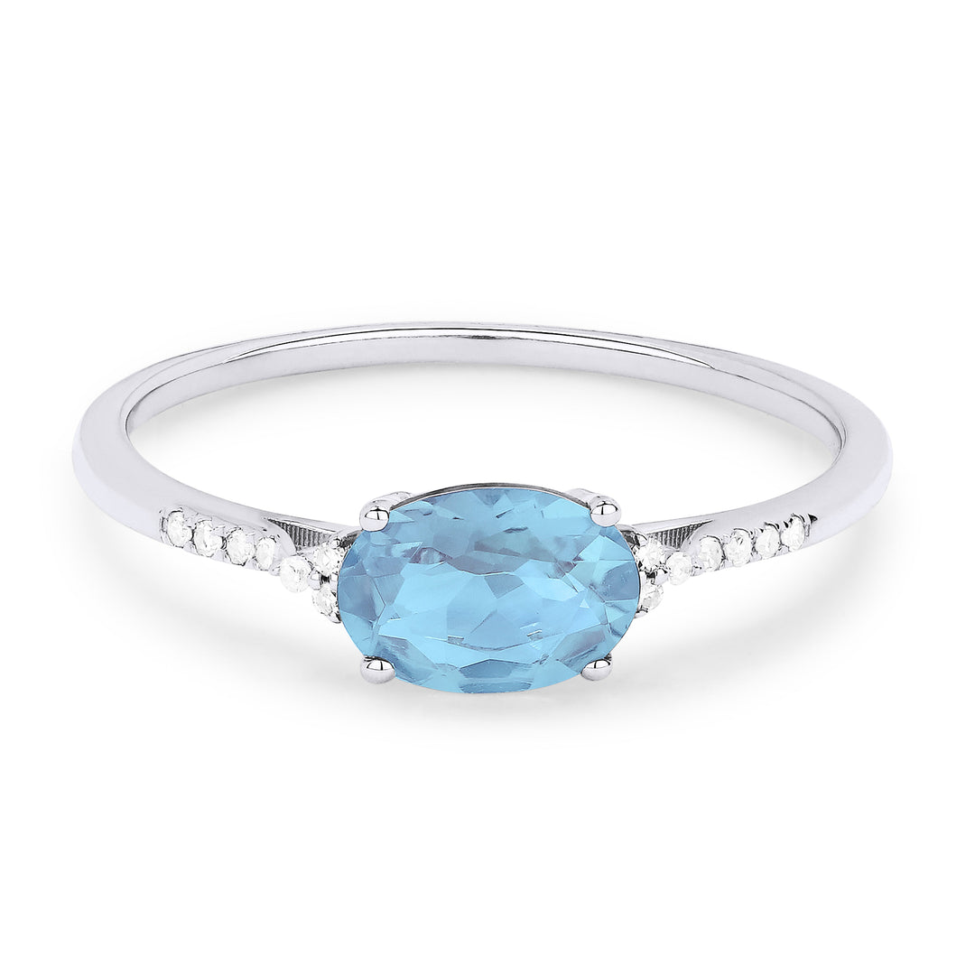 Beautiful Hand Crafted 14K White Gold 7X5MM Blue Topaz And Diamond Essentials Collection Ring