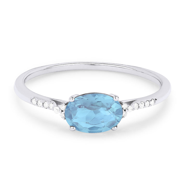 Beautiful Hand Crafted 14K White Gold 7X5MM Blue Topaz And Diamond Essentials Collection Ring