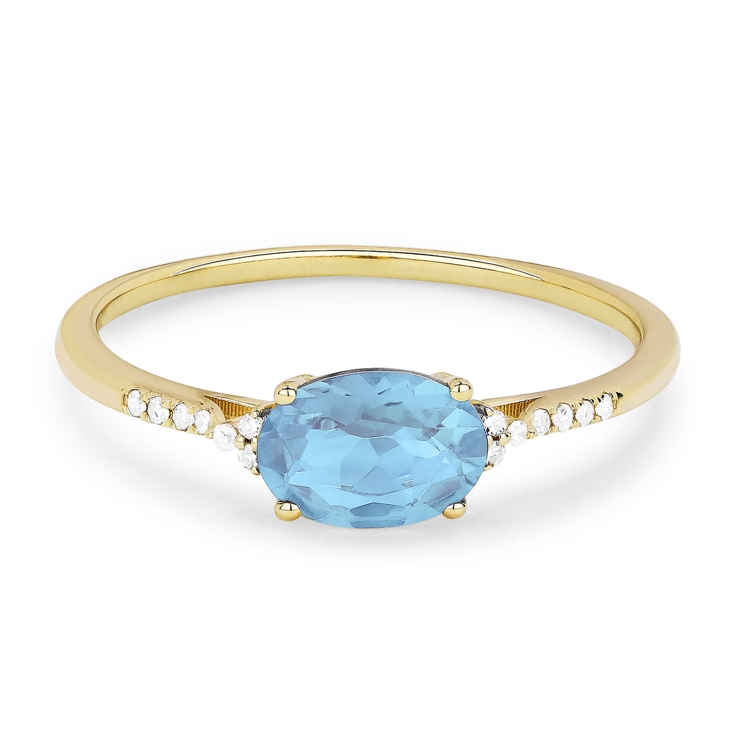 Beautiful Hand Crafted 14K Yellow Gold 7X5MM Blue Topaz And Diamond Essentials Collection Ring