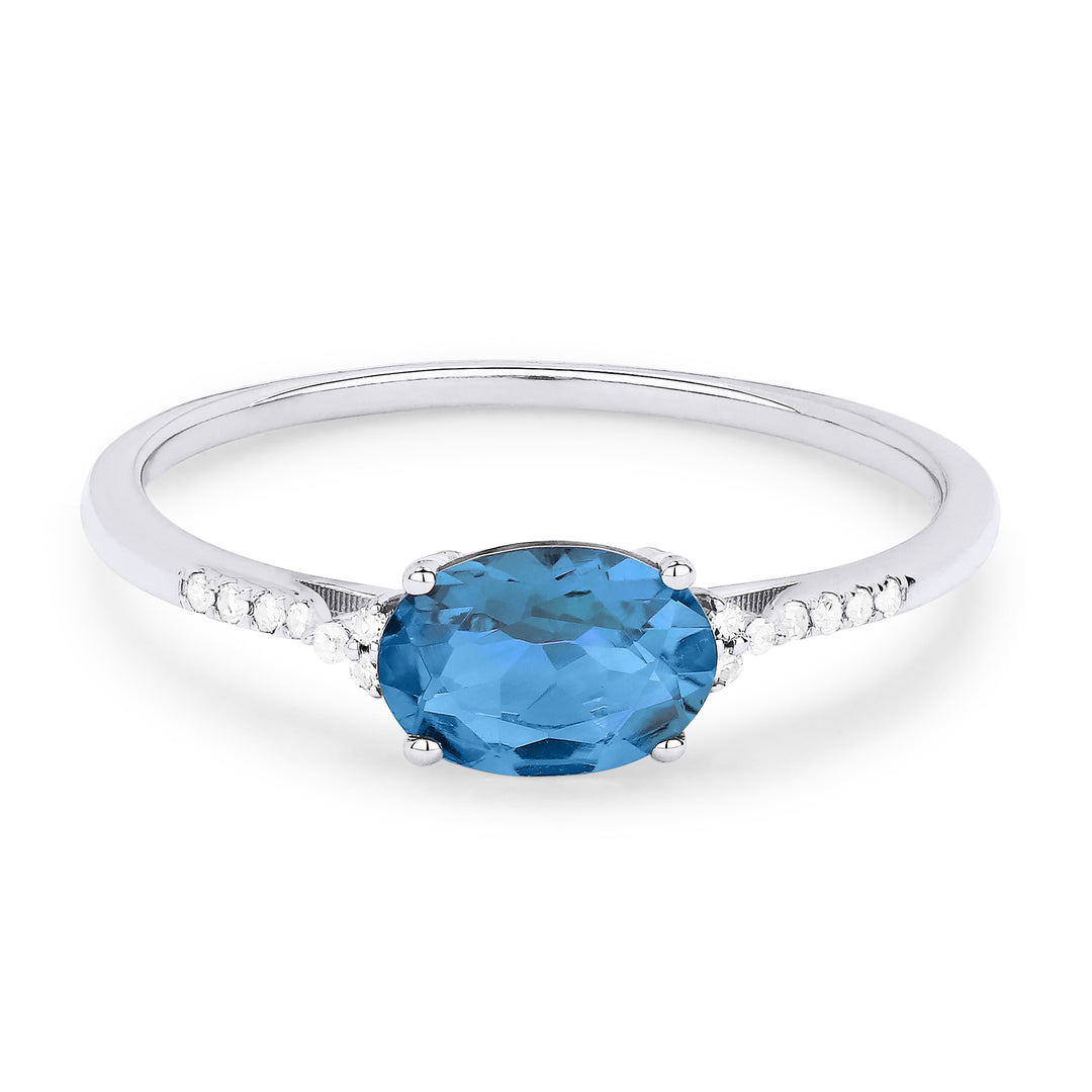 Beautiful Hand Crafted 14K White Gold 7X5MM Swiss Blue Topaz And Diamond Essentials Collection Ring