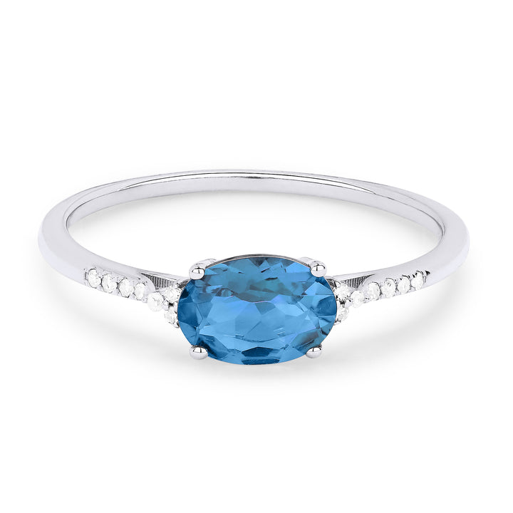Beautiful Hand Crafted 14K White Gold 7X5MM Swiss Blue Topaz And Diamond Essentials Collection Ring