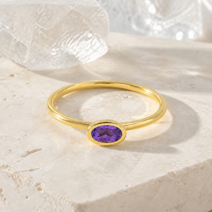 R1499 - 14K Yellow Gold Aquamarine & Garnet Oval Ring