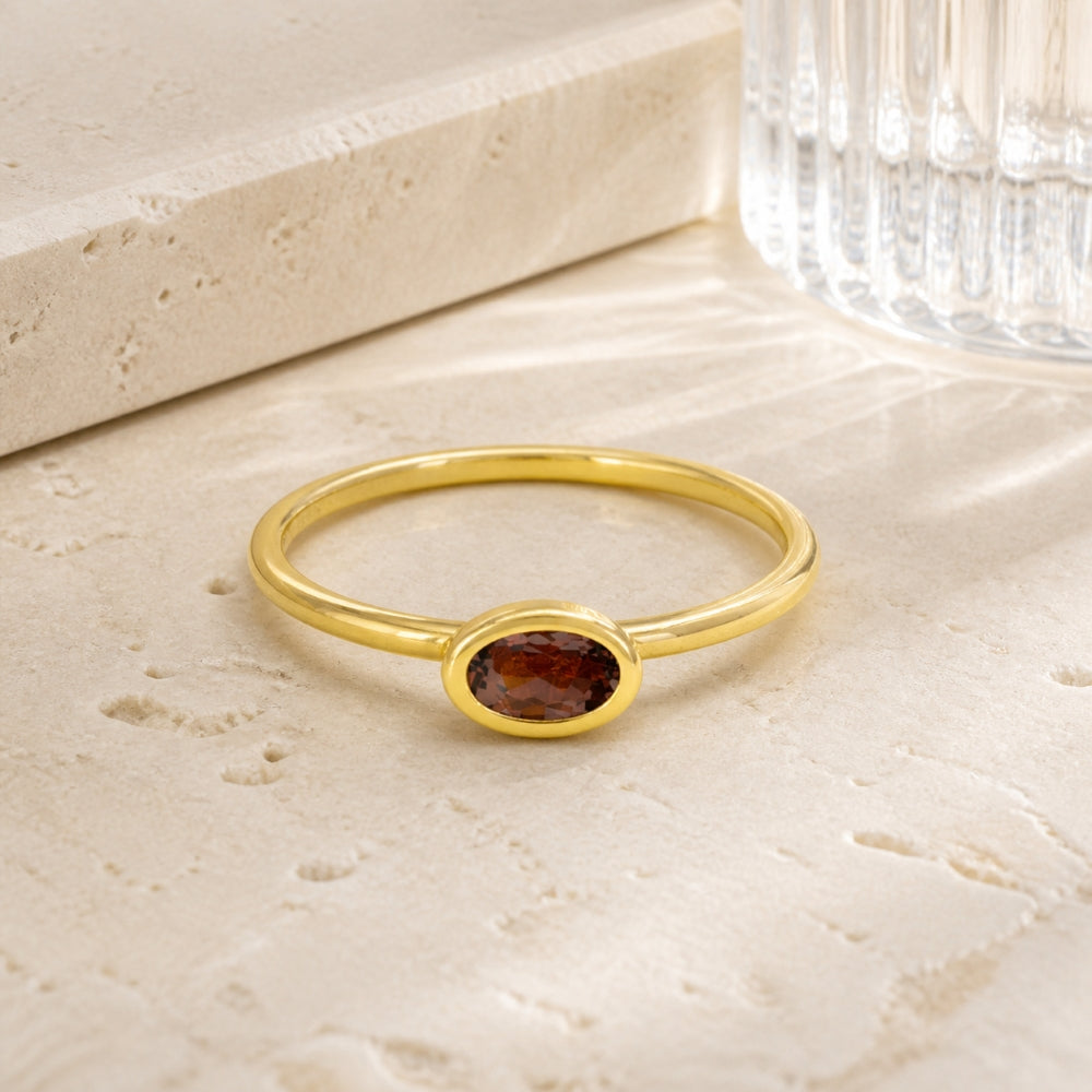 R1499 - 14K Yellow Gold Aquamarine & Garnet Oval Ring