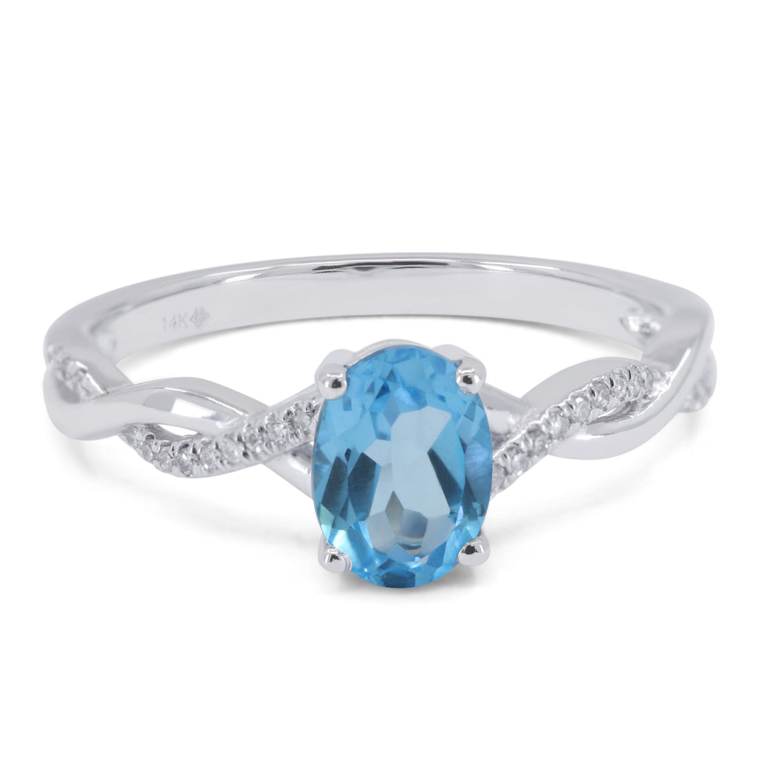 Beautiful Hand Crafted 14K White Gold 5X7MM Swiss Blue Topaz And Diamond Essentials Collection Ring