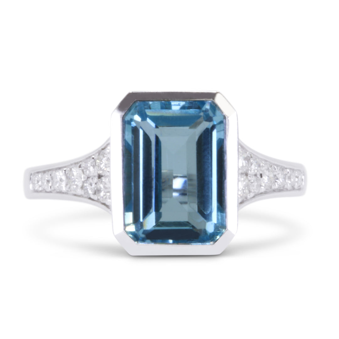 Beautiful Hand Crafted 14K White Gold 7X10MM Blue Topaz And Diamond Essentials Collection Ring