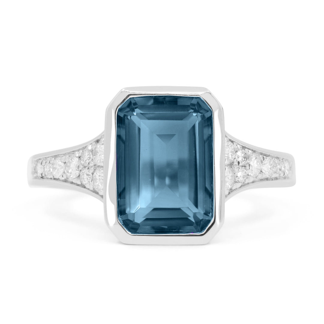 Beautiful Hand Crafted 14K White Gold 7X10MM Swiss Blue Topaz And Diamond Essentials Collection Ring